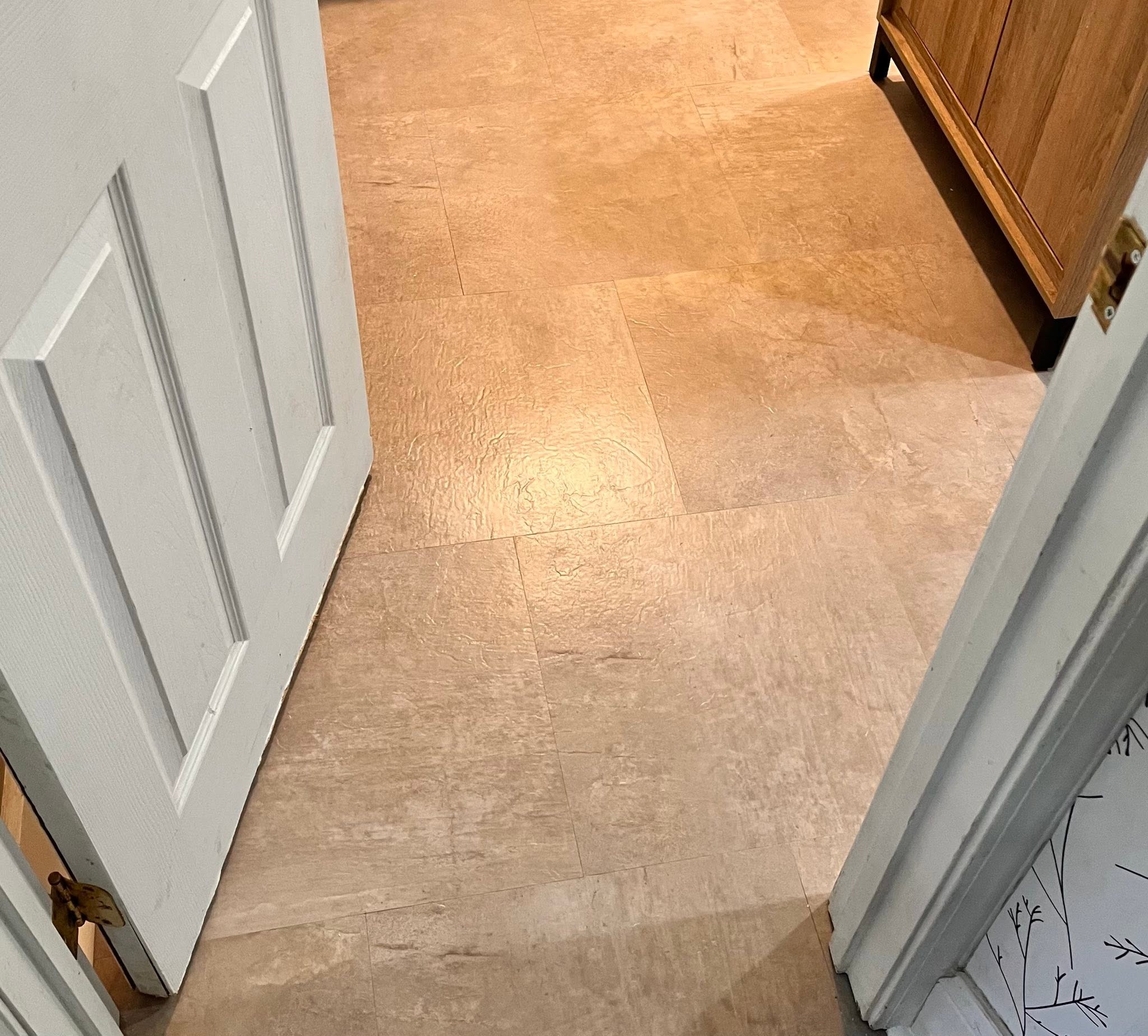 Warm terracotta-toned tile flooring.
