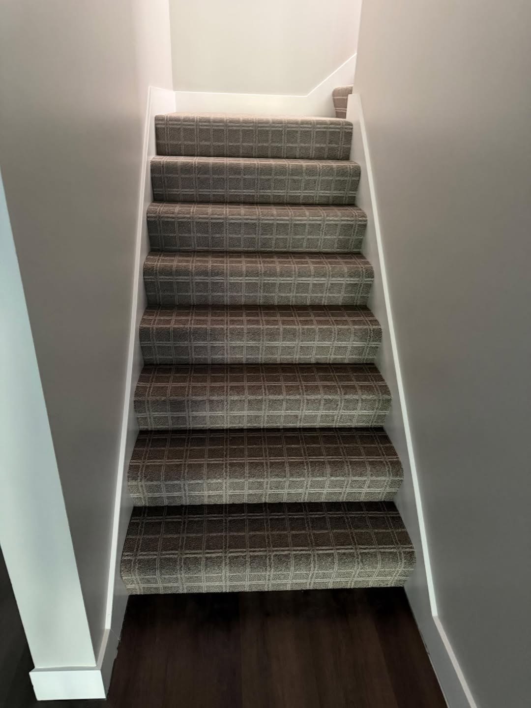 ShawMark Anything Goes patterned carpet in the color Canyon Cliff, on a staircase.