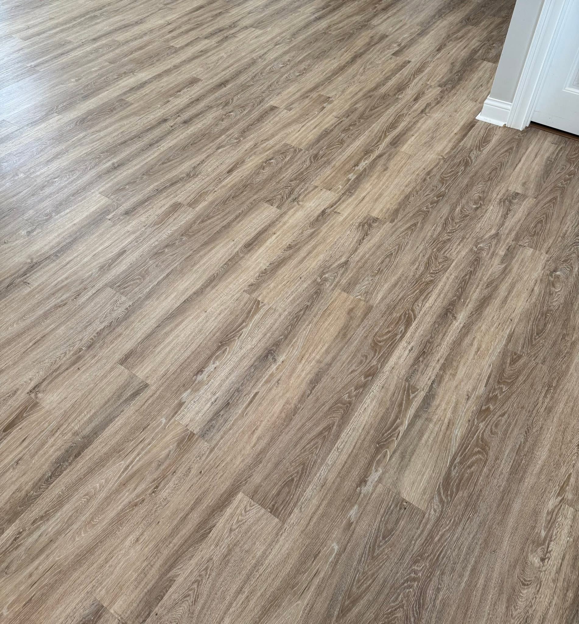 Tarkett InStudio vinyl plank in the color Cooper Bay.