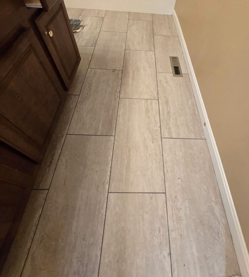 Large-format stone-look tile in a bathroom.