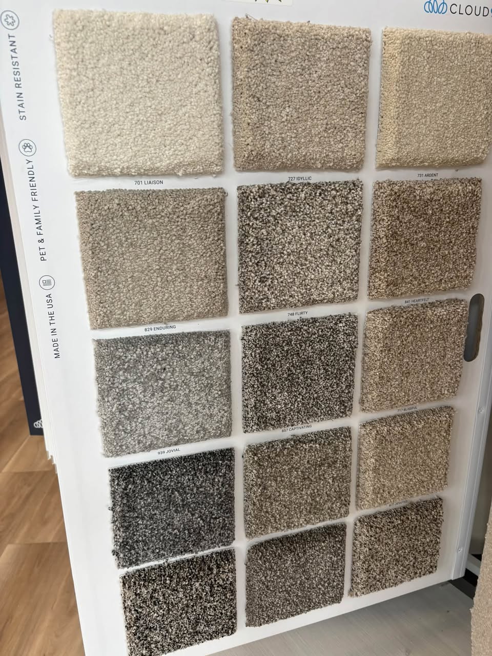 A wall of carpet sample swatches in our showroom.