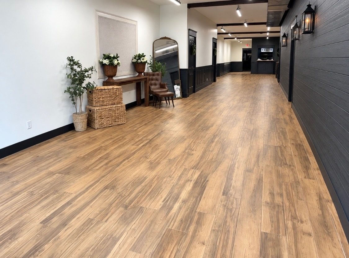 The full length of The Venue's hallway and event space, showing the scale of the room.